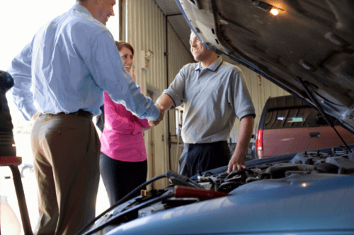 Boost Your Success with Auto Repair Shop Coaching | AutoFix Auto Shop Coaching. An auto repair shop industry consultant talks with a client.